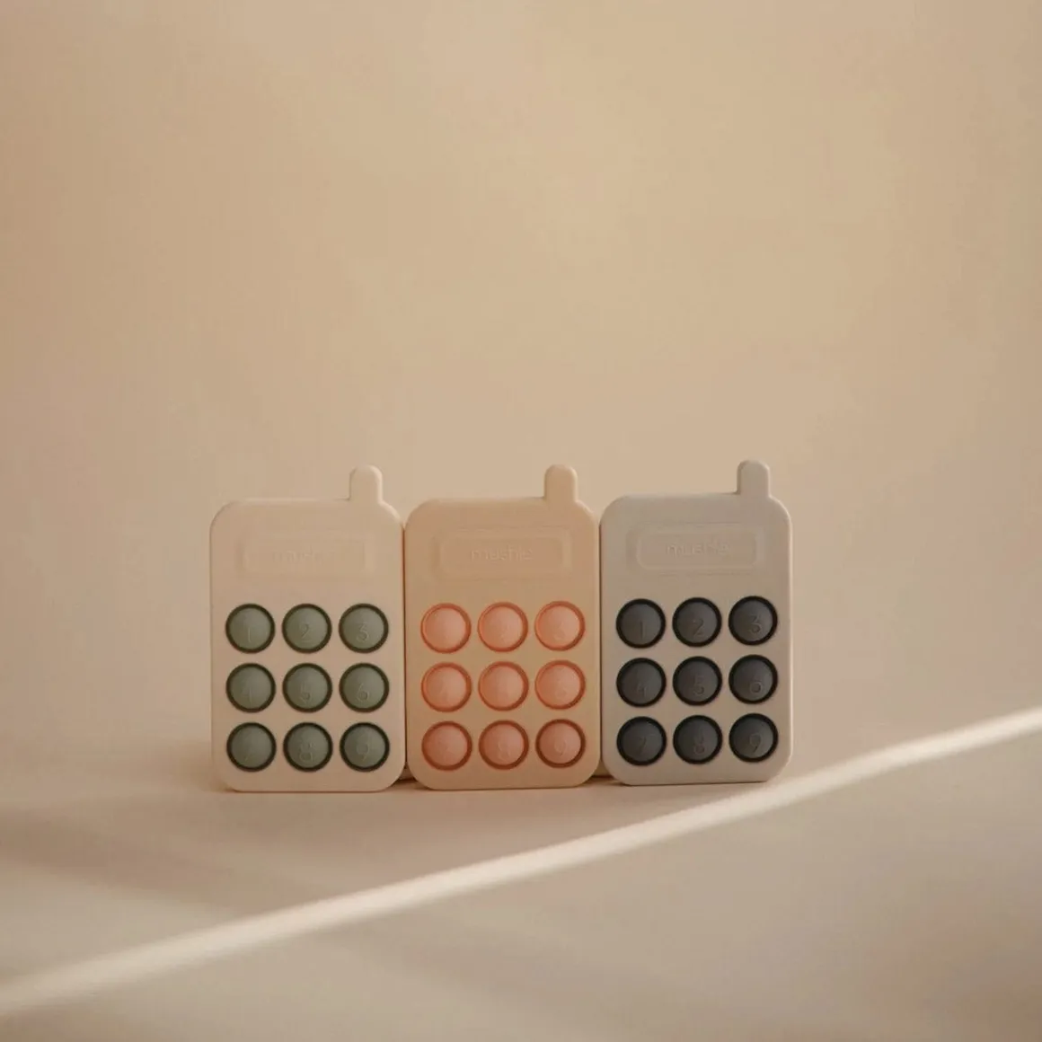 Mushie Phone Press Toy - Tradewinds