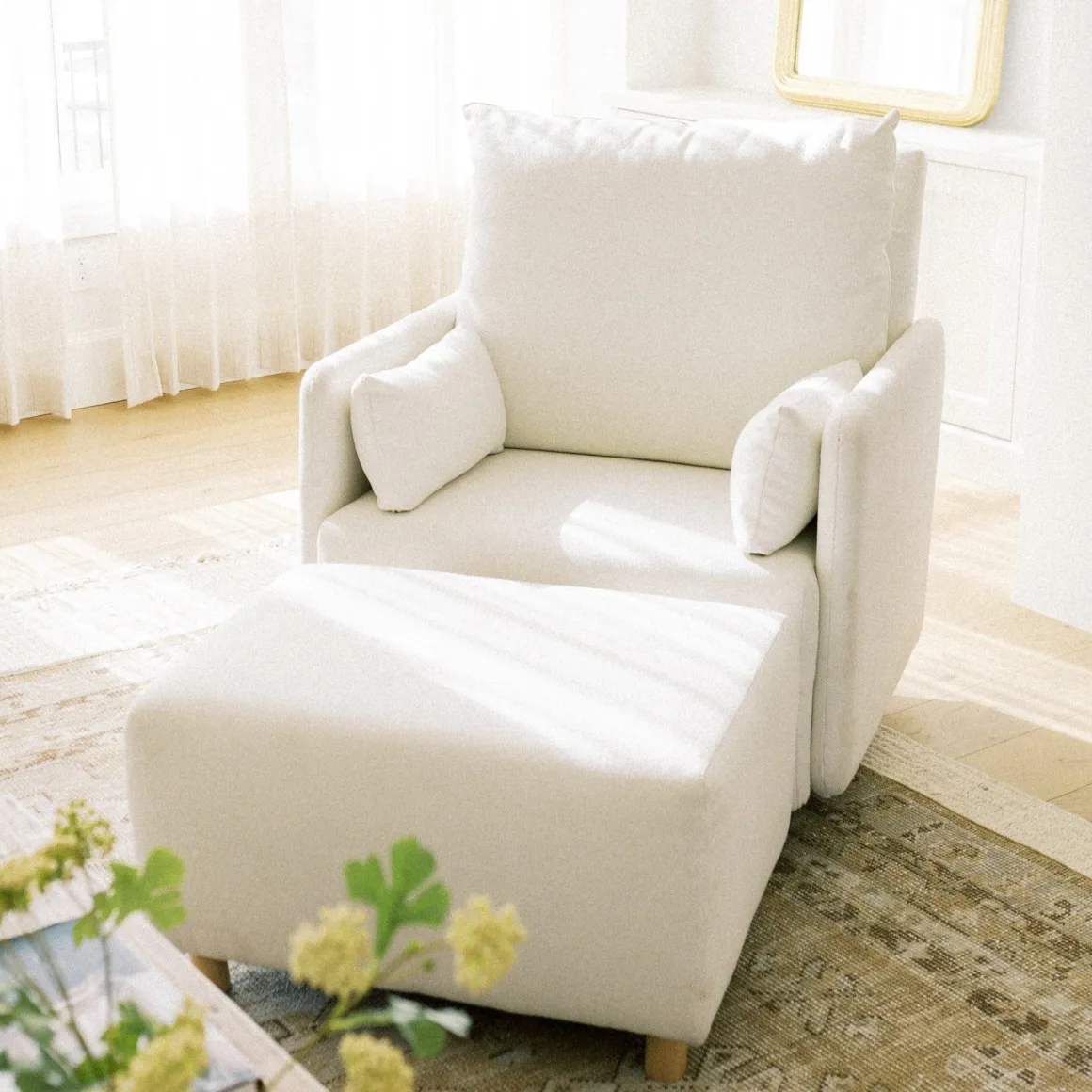 Oilo Ollie: A Chair and a Half Swivel Nursery Glider with Back Recline